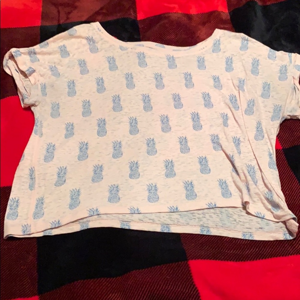 All pink crop top with blue pineapples